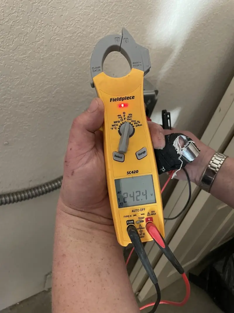 Voltage testing with clamp meter during Generator Installation in St. Helena